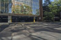 this is a parking garage with a fire hydrant in front of it in an intersection