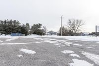 Canadian Farm with Barn, Shed, and Winter Scenery