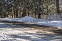 there is snow everywhere around the corner of this street in the neighborhood, while there's still plenty of snow to keep you warm