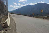 Canadian Highland Road: Surrounded by Nature and Trees with Clouds Above