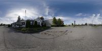 some street with a house and a sky background as an image from the fisheye lens