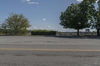 Canadian Residential Road: Trees and Grassy Landscape