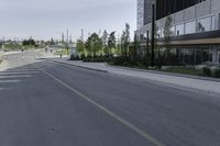 Canadian Road: A View of Buildings and Factory Against Clouds