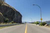 Canadian Road Along Okanagan Lake under Clear Sky