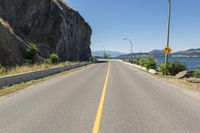 Canadian Road Along Okanagan Lake with Clear Sky