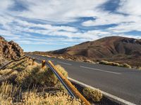 Road Through Canary Islands: Bush, Grass, and Clouds