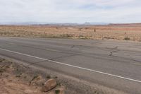 Canyonlands Road: Asphalt Road Under Low Clouds