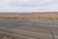 Canyonlands Road: Asphalt Road Under Low Clouds