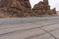 Canyonlands, Utah: Asphalt Road Under a Cloudy Sky