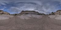 360 - view image of the desert landscape as it is surrounded by large rocks and mountains