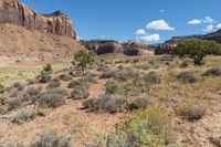 the view from an observation point of a landscape and a few large rocks in the distance