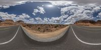 three sides of the highway at high speed in the desert with some clouds above it