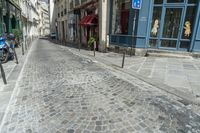 Charming Storefronts on Cobblestone Roads in Paris