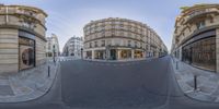 there are two pictures that show different buildings and streets in each of these shots in a wide angle view