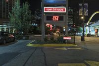 the light up sign in the city of vancouver, canada says it's open but there is 3 23 pm to 6pm