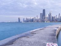 city skyline with the ocean and a path for walking in it by it's water