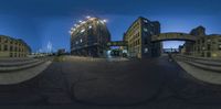 3d photo of an architectural building at night in the city, as seen from a fish eye lens