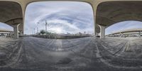 the same image, this time in a fish eye view mirror, shows all four streets