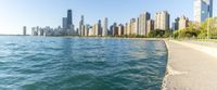 a body of water near some large buildings in the city of chicago, illinois, usa