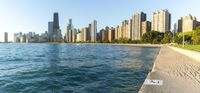 a body of water near some large buildings in the city of chicago, illinois, usa