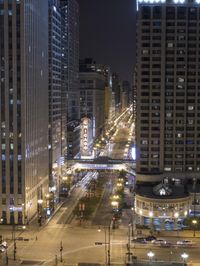 Chicago Night Cityscape: High-rise Buildings Illuminate the City