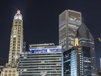 Chicago Night Cityscape: High-rise Buildings Illuminate the City
