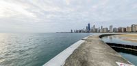 the view of chicago from lake michigan is almost empty in this photo, it is an empty boat dock and is not visible to us