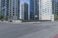 a city filled with lots of tall buildings on top of a gray concrete floor underneath blue sky