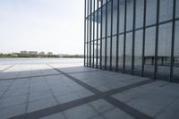 the view out over a body of water, through many windows on a building complex