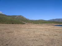 China Landscape with Mountains, Lake, and Village