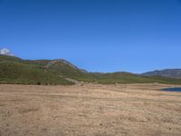 China Landscape with Mountains, Lake, and Village