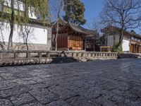 several houses lined up next to each other on a small courtyard area in china's ancient city