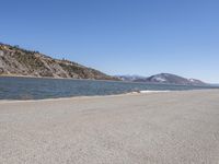 China's Mountain Landscape: Asphalt Road Leading to a Beach