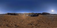 a wide angle view of the desert mountains from different angle view points on the terrain