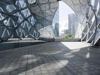 China's Urban Cityscape: A Glass Building Reflecting the City's Beauty