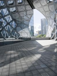 China's Urban Cityscape: A Glass Building Reflecting the City's Beauty