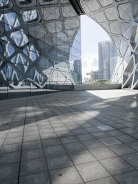 China's Urban Cityscape: A Glass Building Reflecting the City's Beauty