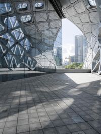 China's Urban Cityscape: A Glass Building Reflecting the City's Beauty