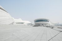 this is an image of people walking outside a modern building in chinas new city