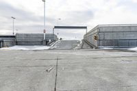 an open airway with snow covered ramps under it at the end of it