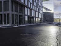 City Buildings at Dawn with Water Reflections