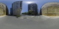 three circular shots of a city with a building behind them in the distance and on one corner