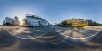 this is a panorama view of a road taken in the city center of a big city