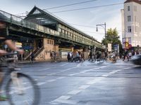 the view under the highway, on a rainy day of the city street and on the streets with buildings and bicycles