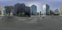 there are lots of buildings in the background on a street side panoramic lens