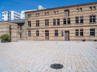 this is an image of a courtyard in a very large building that appears to be a museum