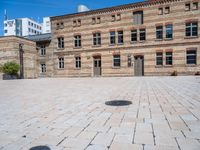 this is an image of a courtyard in a very large building that appears to be a museum