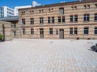 this is an image of a courtyard in a very large building that appears to be a museum