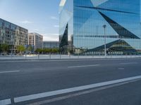 this is a photo of a deserted street with buildings and a lot of vehicles on the road