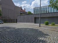 City Life in Berlin: Cobblestone Roads and Modern Architecture